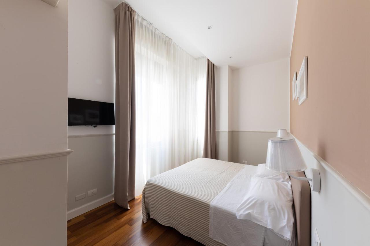 Chambre Quadruple - Vue Partielle sur Mer