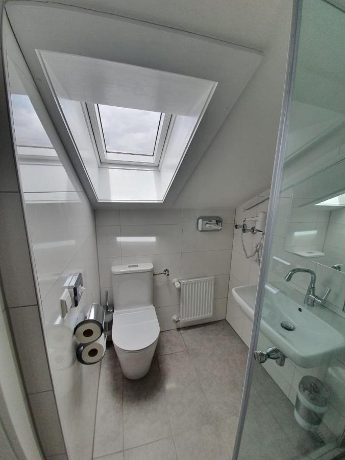 Single Room with Shared Shower and Toilet