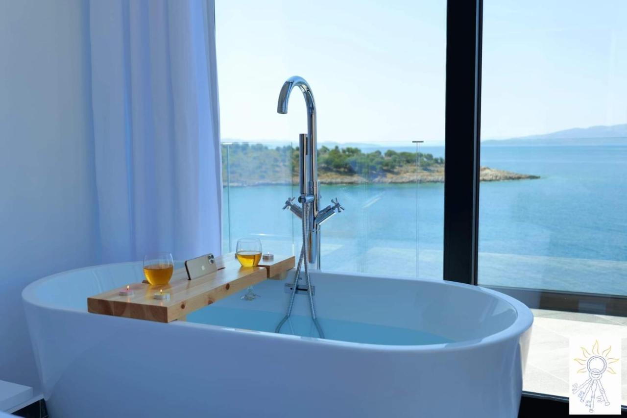 Deluxe tweepersoonskamer met balkon en uitzicht op zee