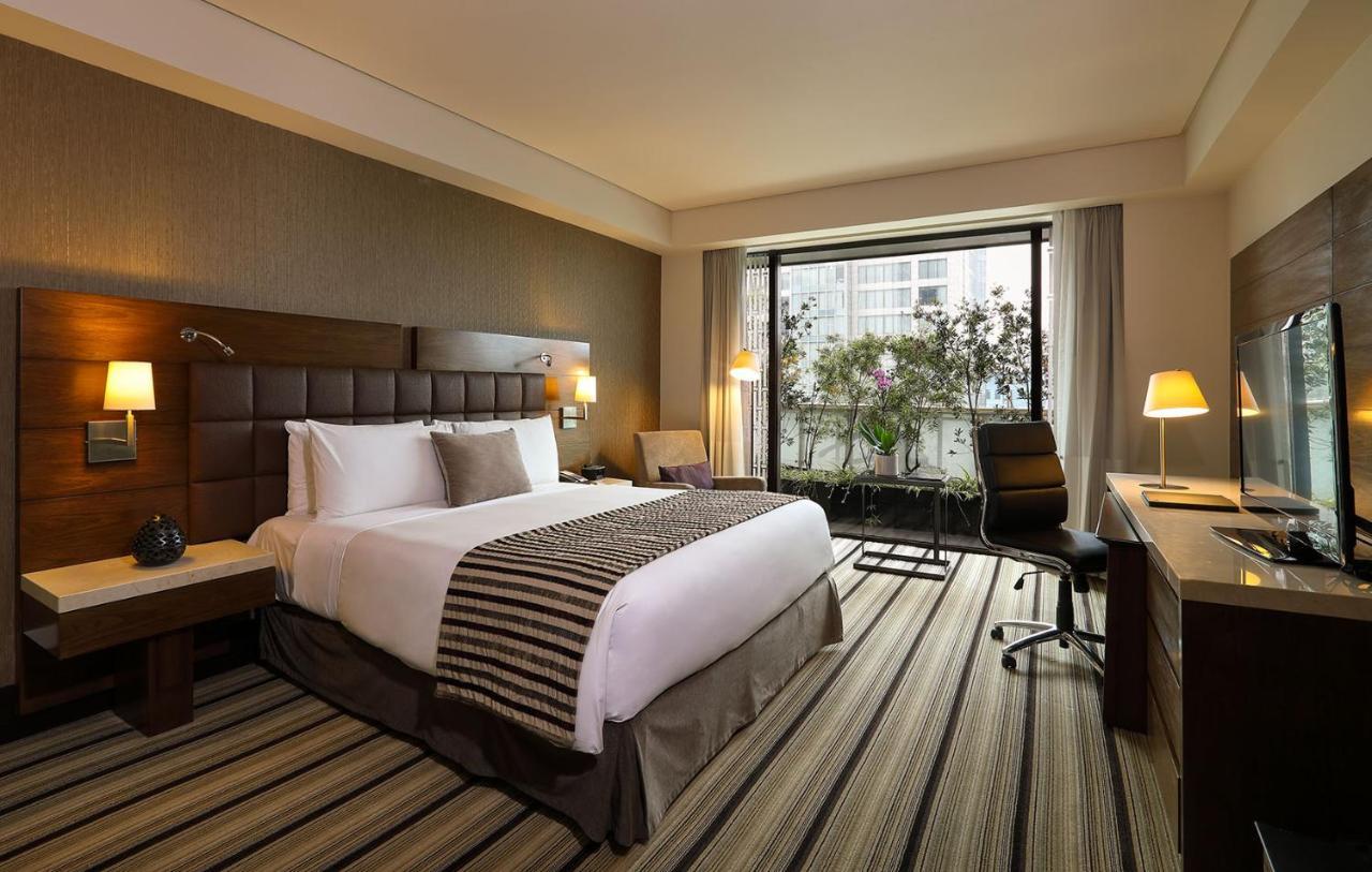 Deluxe Zimmer mit 1 Kingsize-Bett und Stadtblick