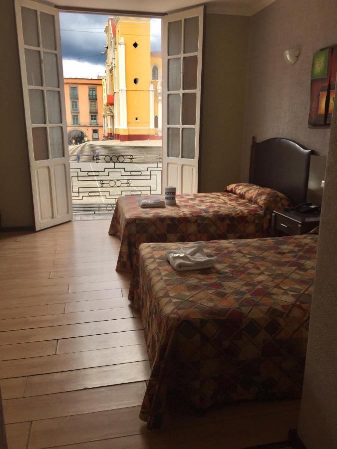 Habitación Triple con balcón
