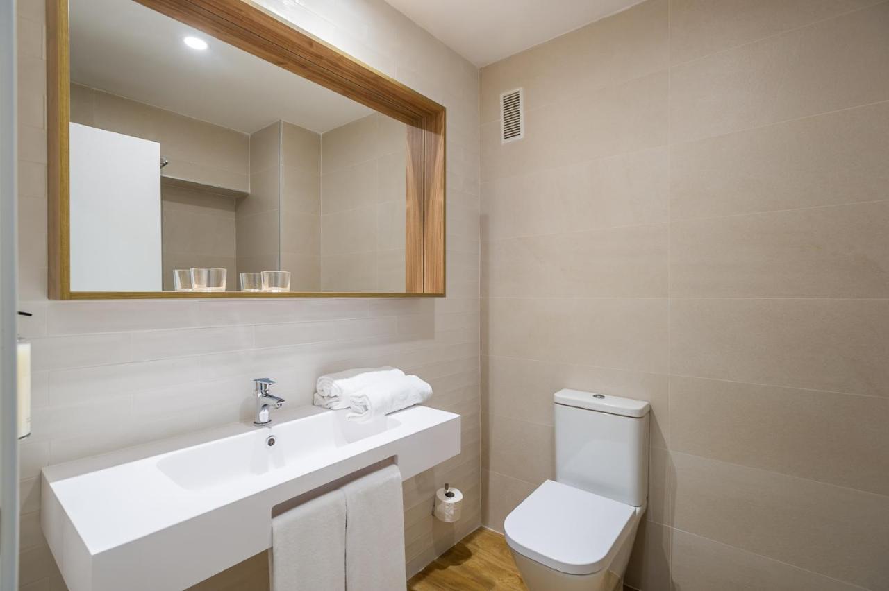 Double or Twin Room with 2 Extra Beds (3 Adults + 1 Child)