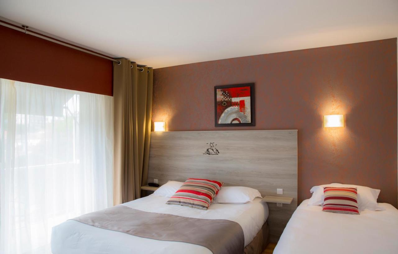Chambre Triple avec Balcon et Vue sur le Jardin