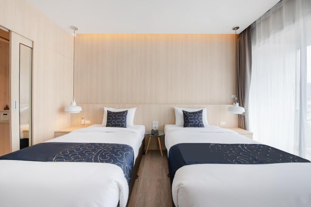 Deluxe Tweepersoonskamer met 2 Aparte Bedden en Uitzicht op Zee