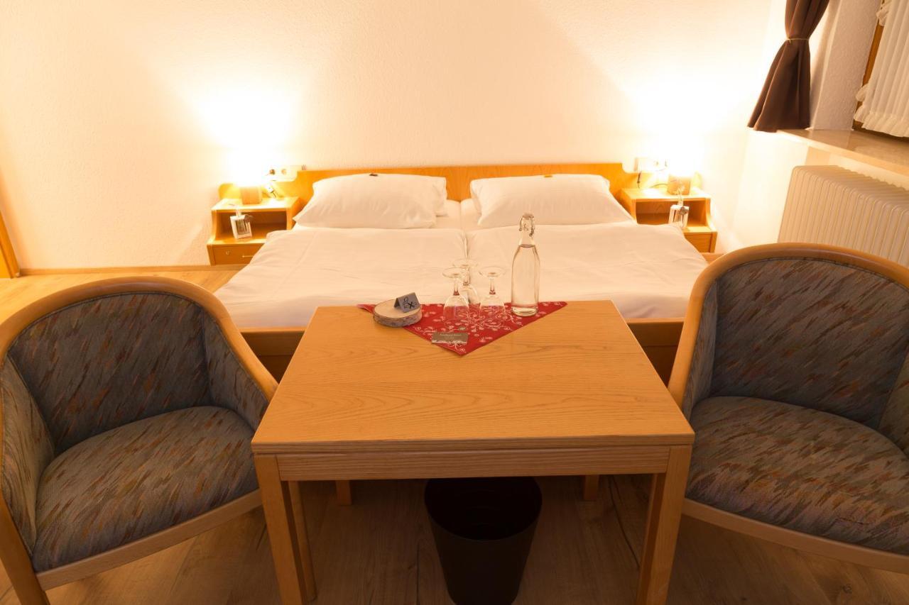 Dreibettzimmer mit Balkon