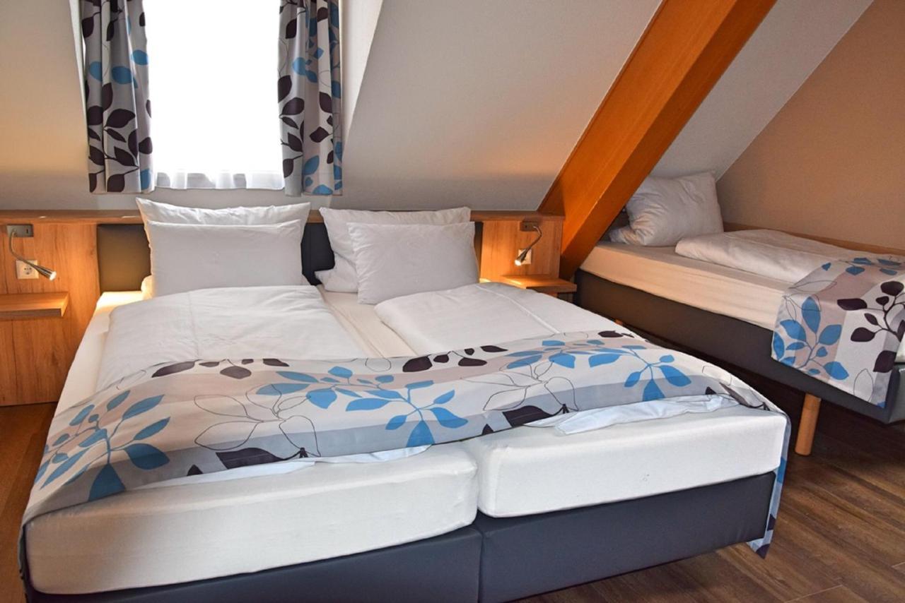 Dreibettzimmer