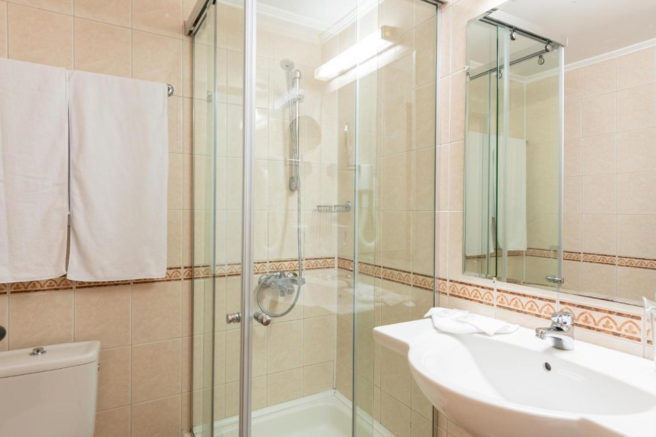 Double Room with Side Sea View (1 Adult + 1 Child)
