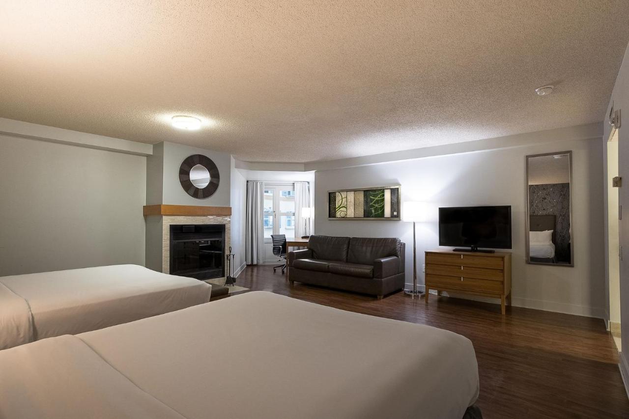 Comfort room with 2 Queen beds and sofa bed