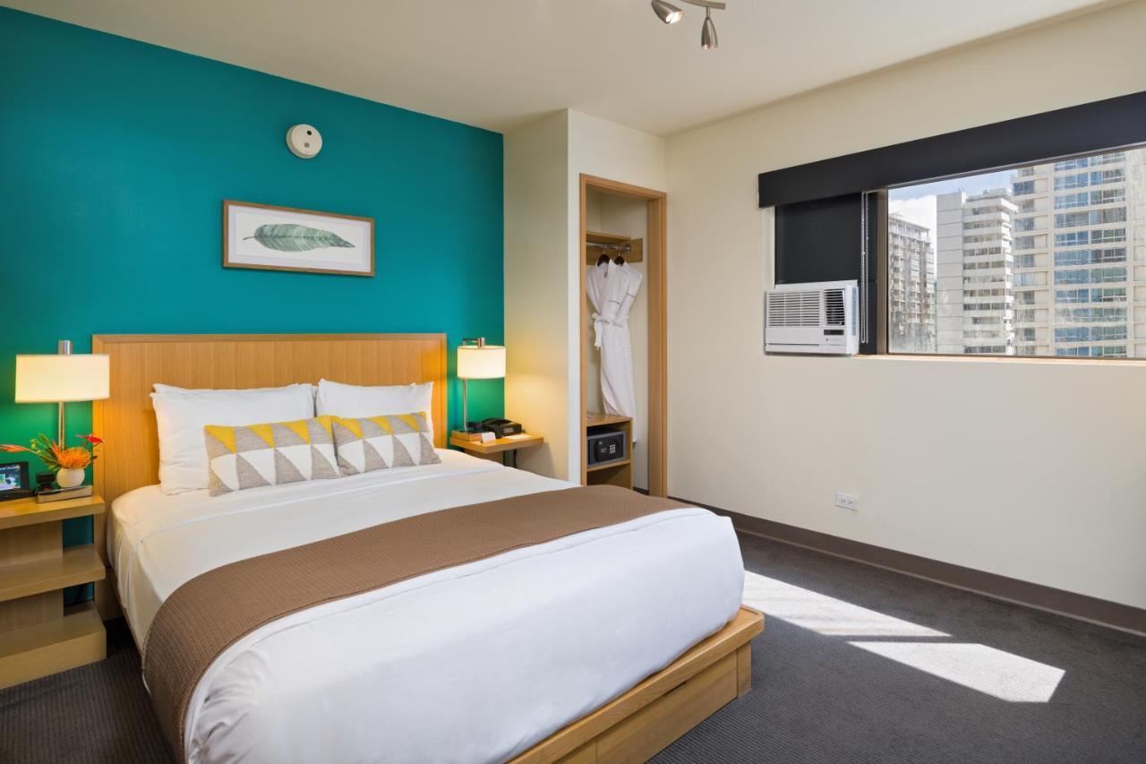 Kamer met Queensize Bed en Uitzicht op Zee