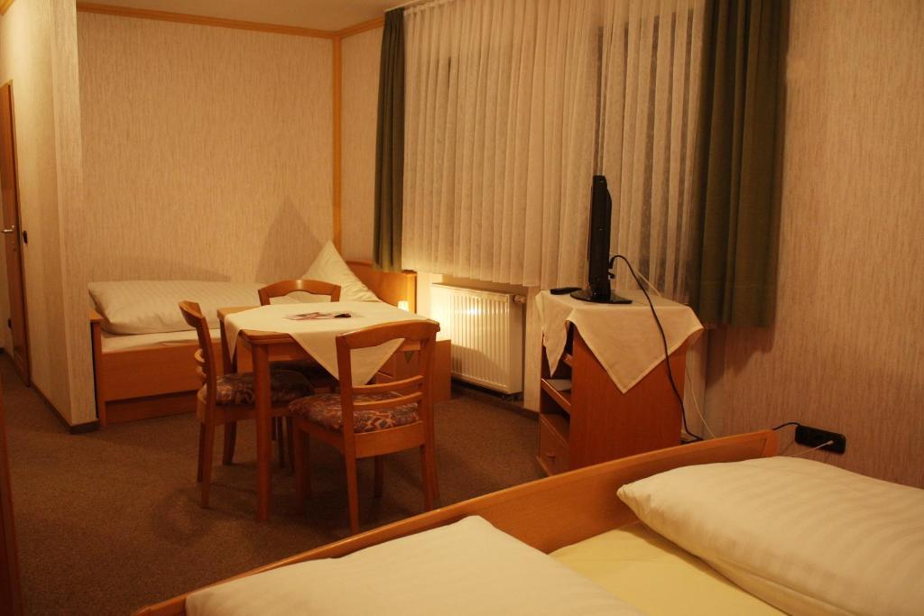 Dreibettzimmer
