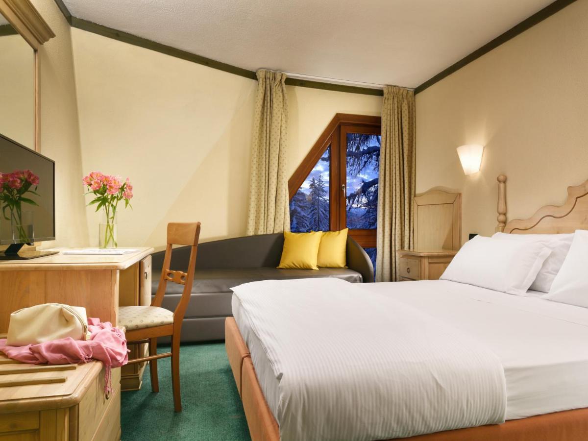 Triple Room (2 Adults + 1 Child)