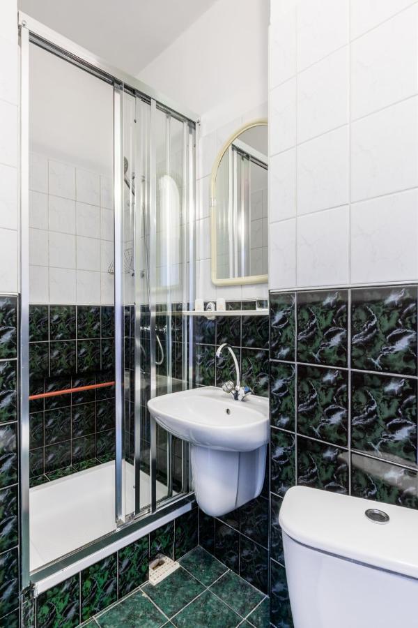 Small Double Room with Small Bathroom (Parking view)