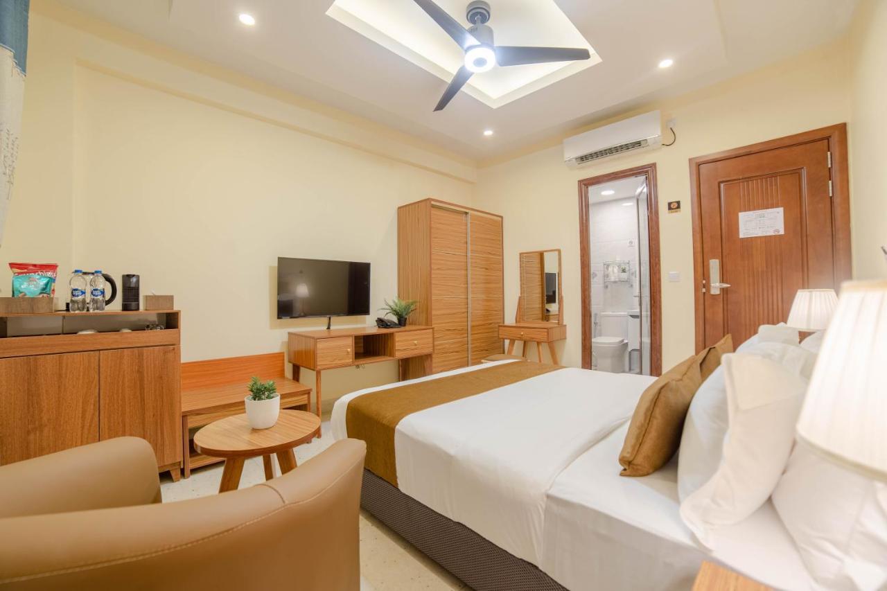 Deluxe Queen Room with City View & Balcony (Free Return Airport Transfer)