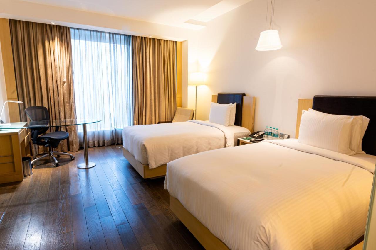 Standard Twin Room - Smoking with 20% discount on food and and soft beverages and INR 500 credit on food and soft beverages once during the stay