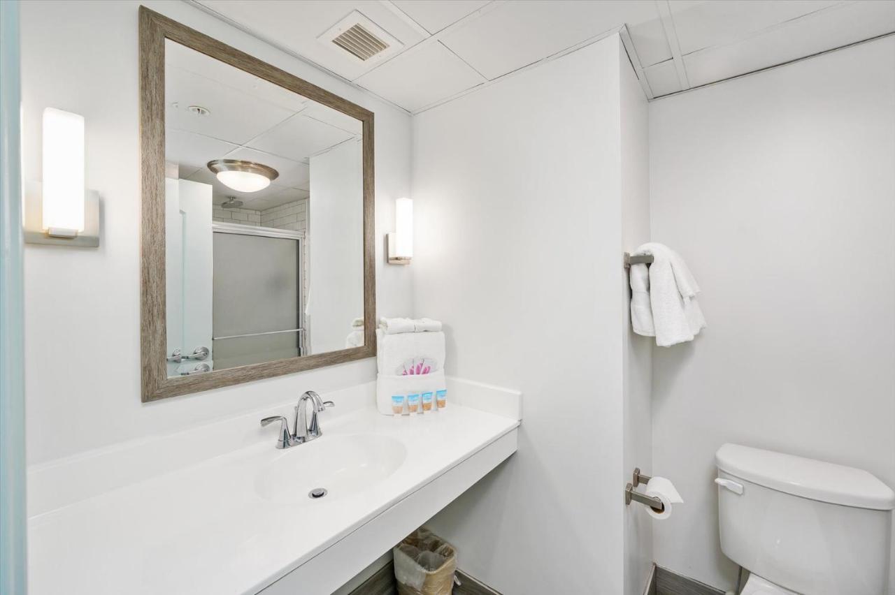 Side Ocean View with Balcony, 2 Double Beds and Kitchenette