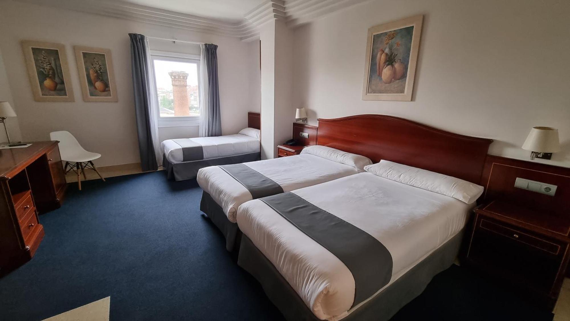Dreibettzimmer