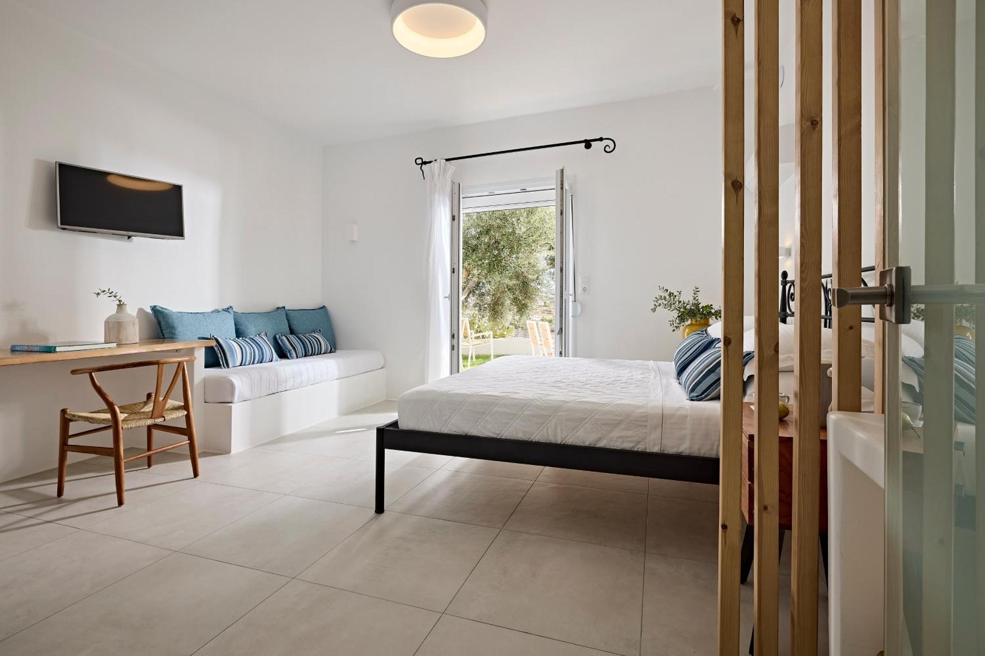 Habitación Triple con vistas al jardín