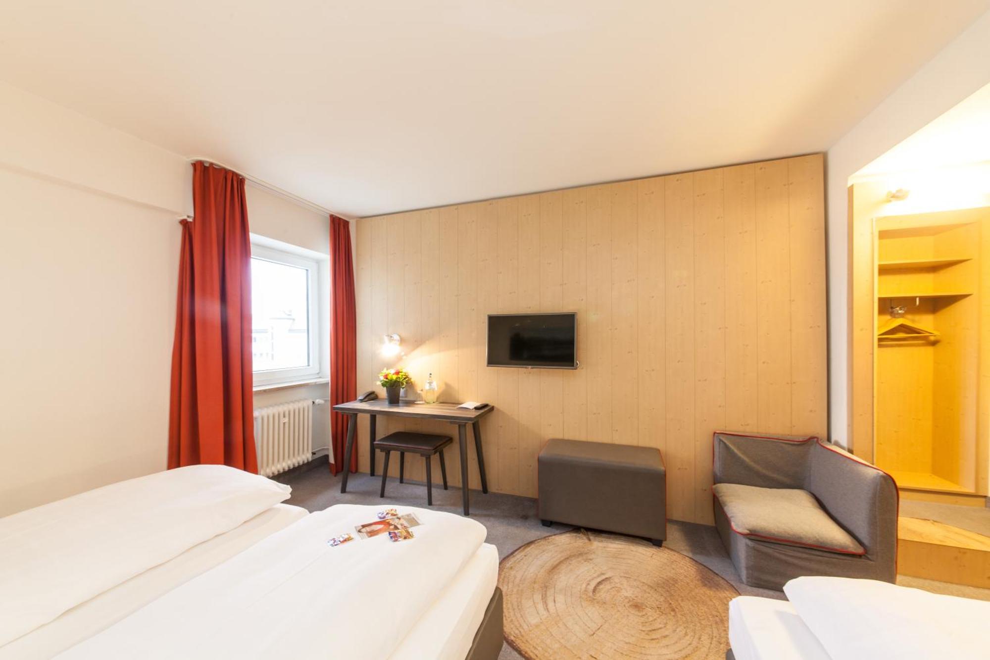 Standard Dreibettzimmer mit 3 Einzelbetten