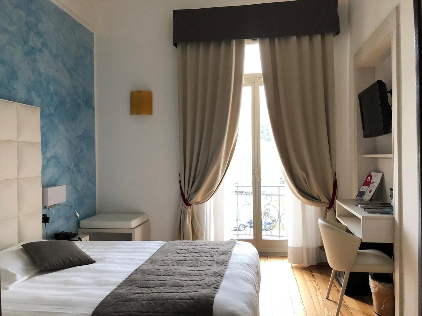Dreibettzimmer mit Meerblick