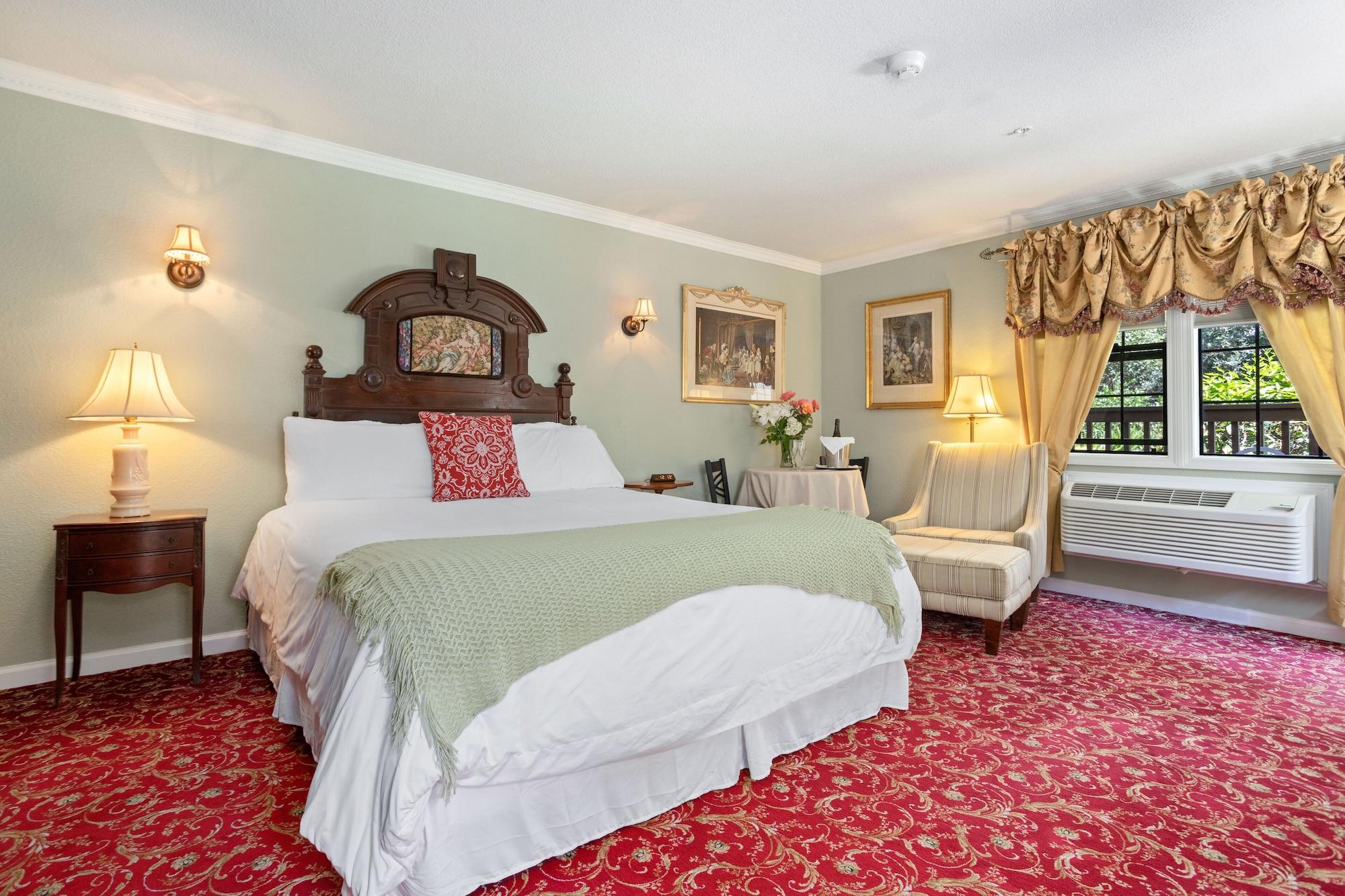 Habitación con cama extragrande y bañera de hidromasaje