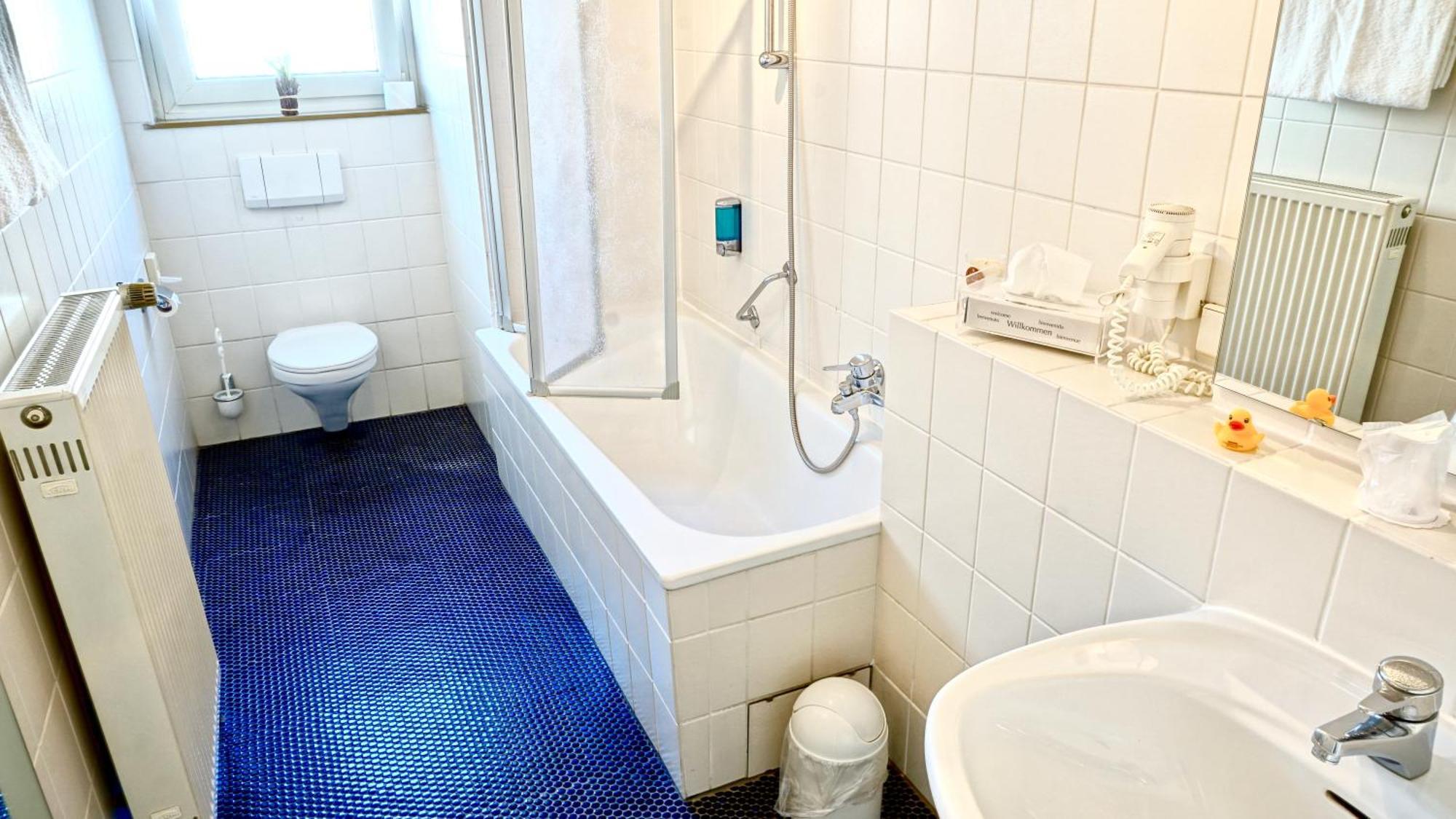 Tweepersoonskamer met 2 Aparte Bedden