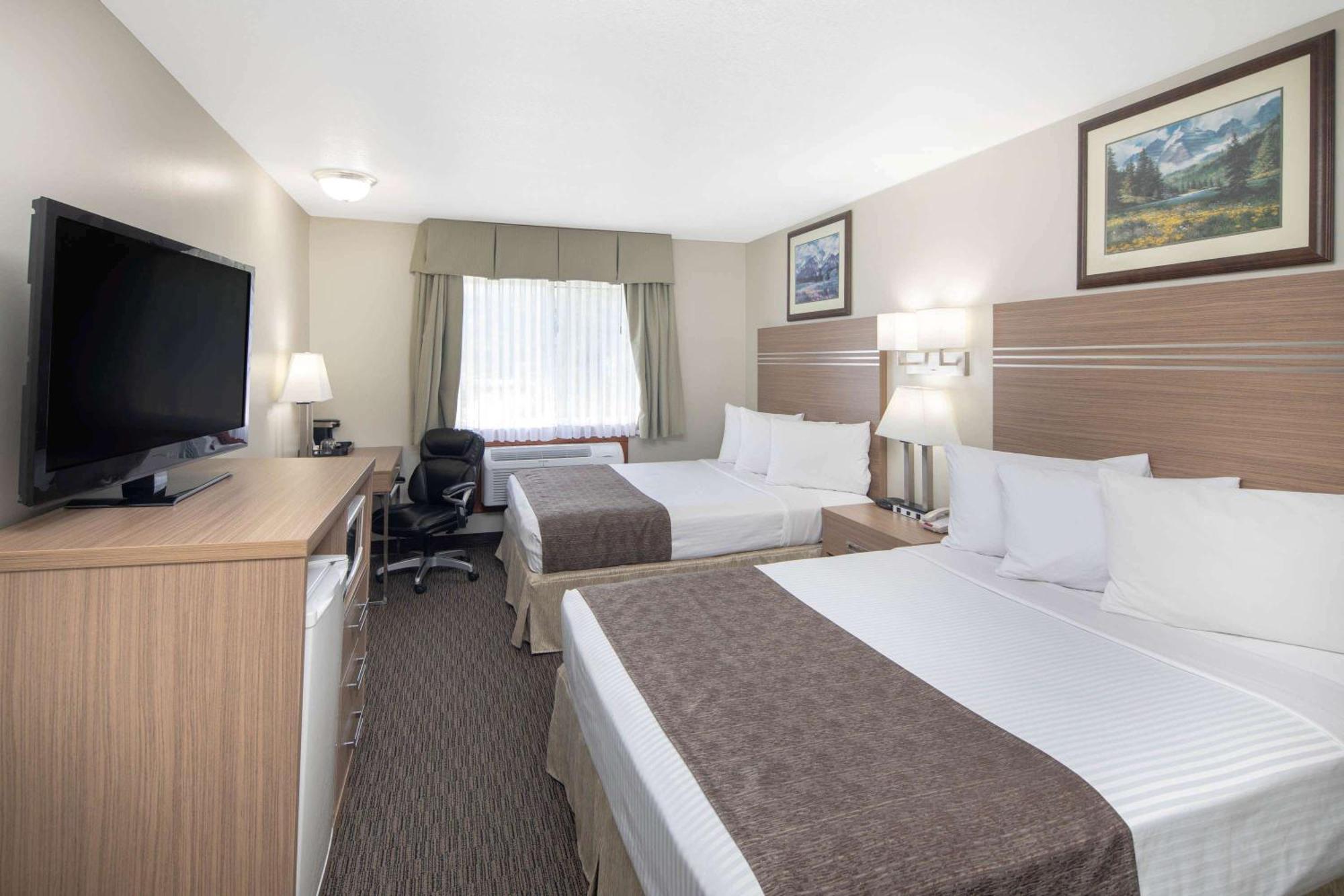 Room with One King Bed and One Queen Bed (Ground Floor) - Non-Smoking