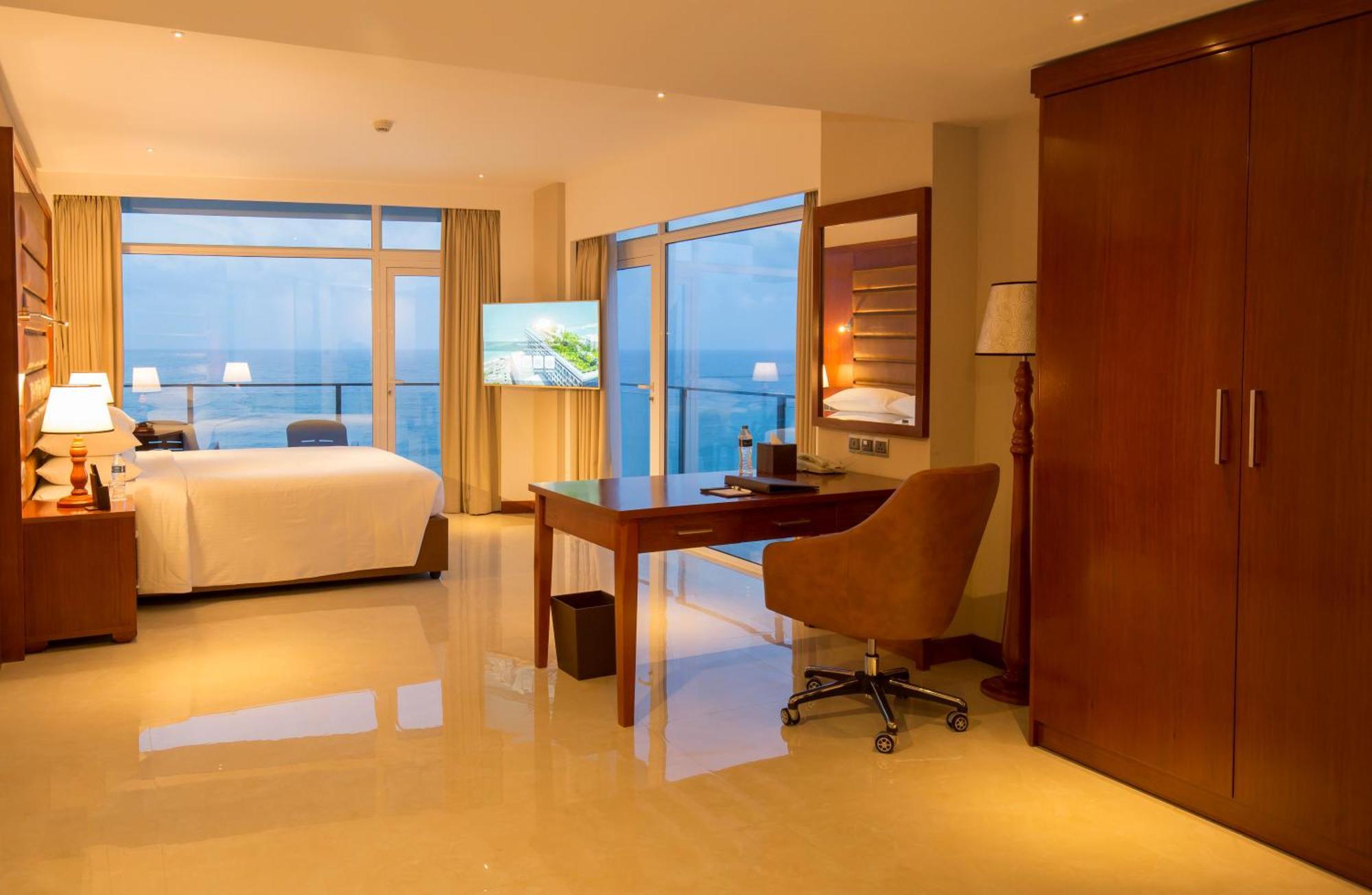 Signature Sea View One Bed Room Suite Complimentary City Tour & Access to Beach Lounge