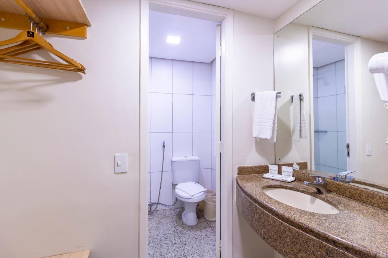 Quarto Triplo Executivo com Camas de Solteiro