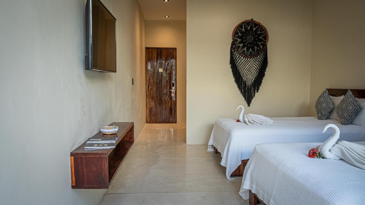 Habitación Cuádruple - vistas al jardín