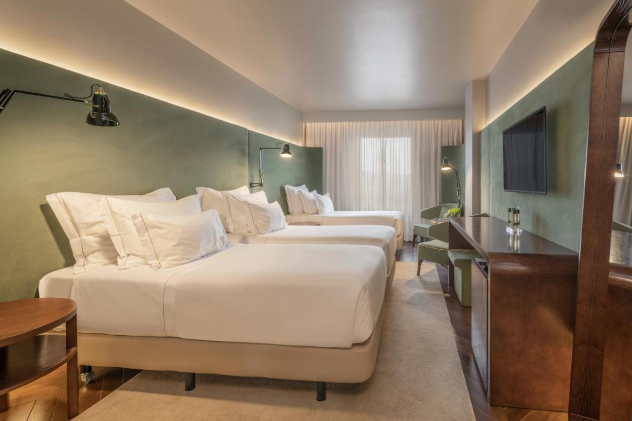 Chambre Triple - Vue sur Ville