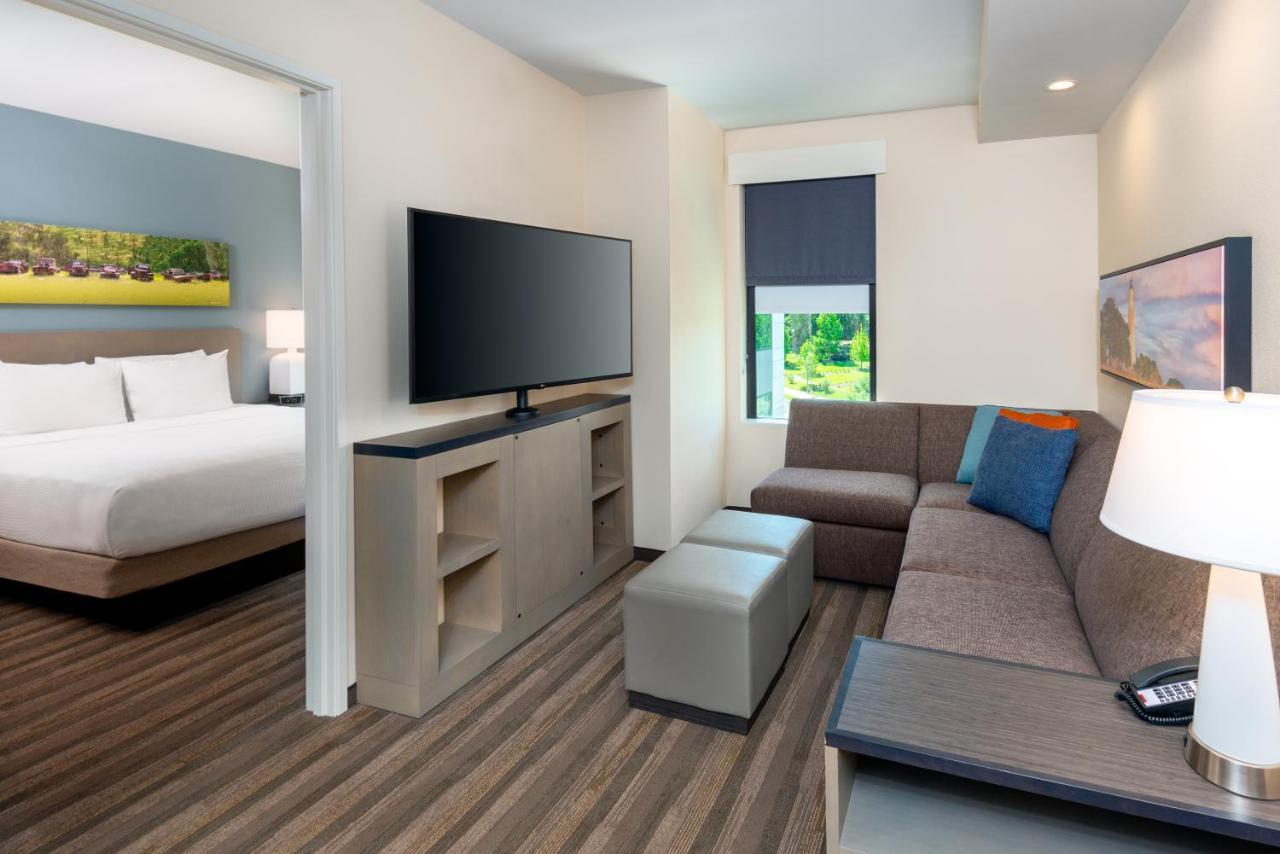 One-Bedroom King Suite Sofa Bed Kitchen Tub Disability Access