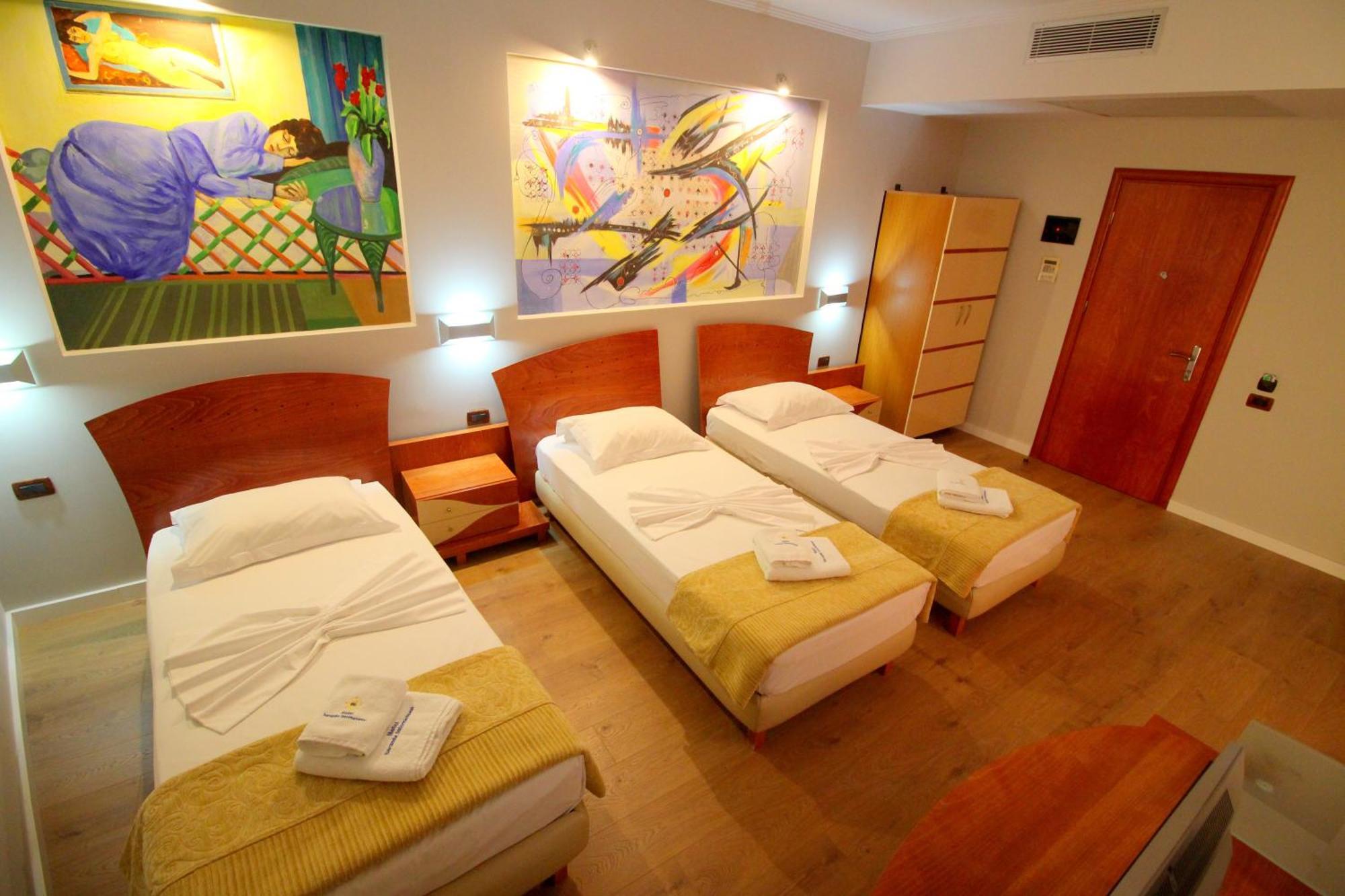 Habitación Triple con balcón