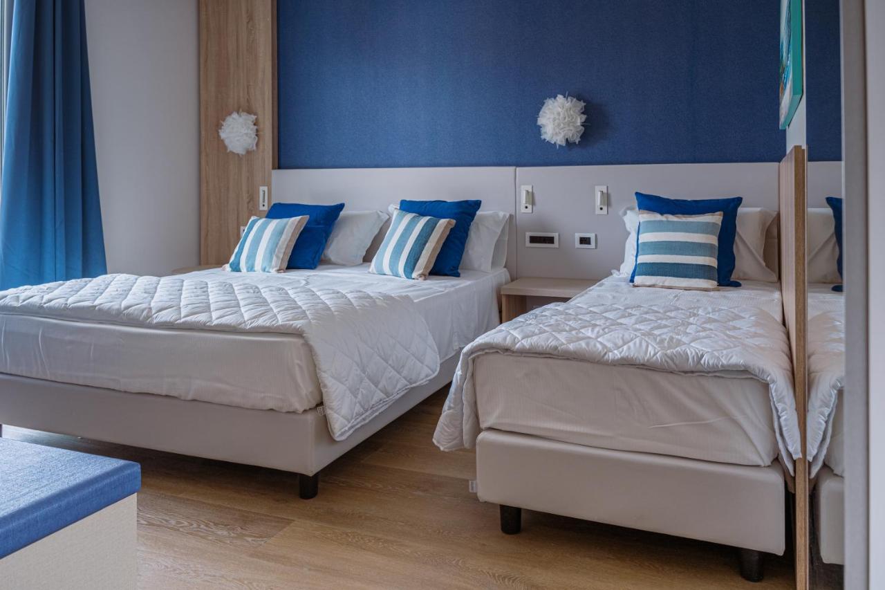 Superior Triple Room with Side Sea View