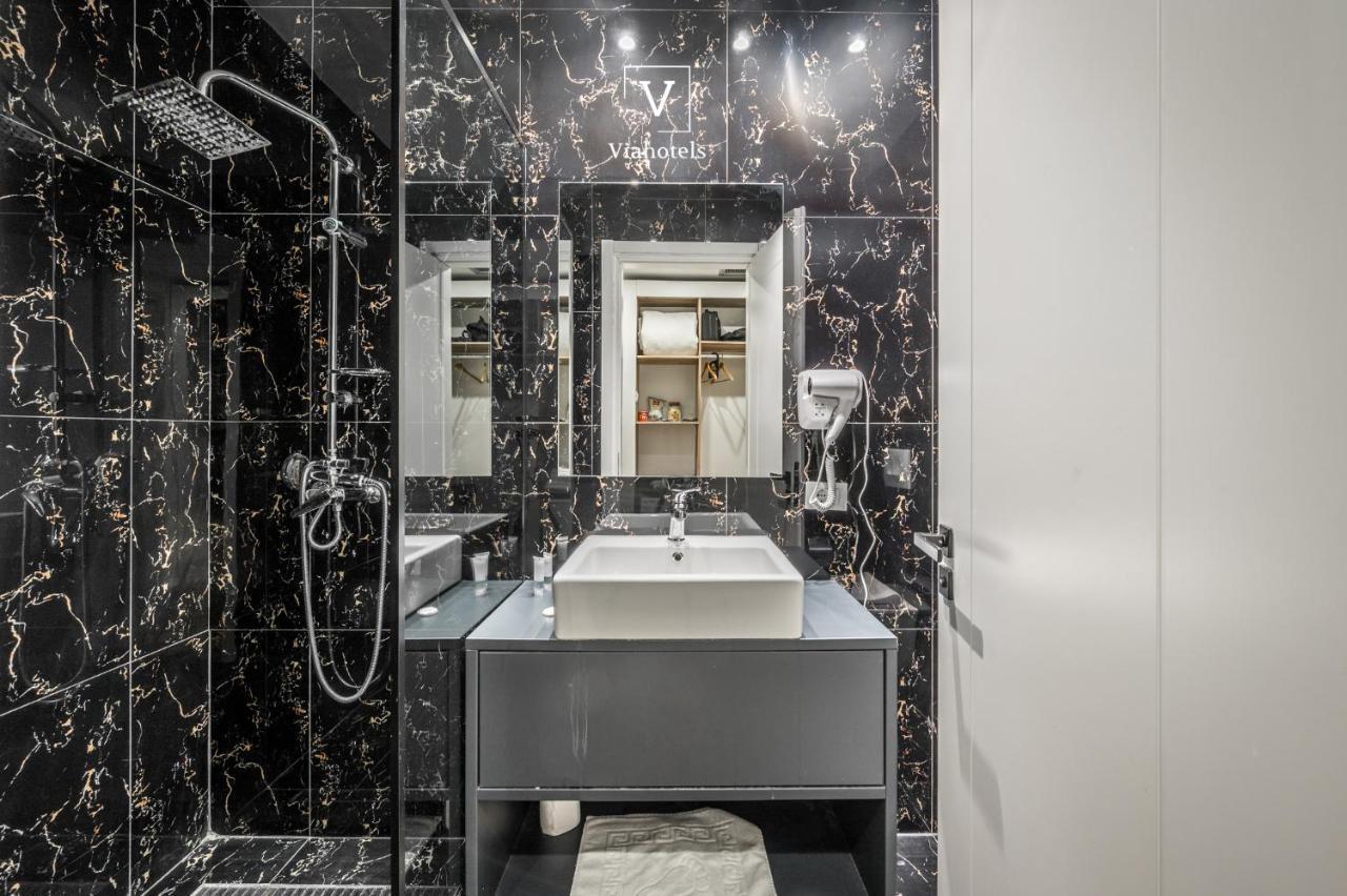 Chambre Triple - Vue sur Ville