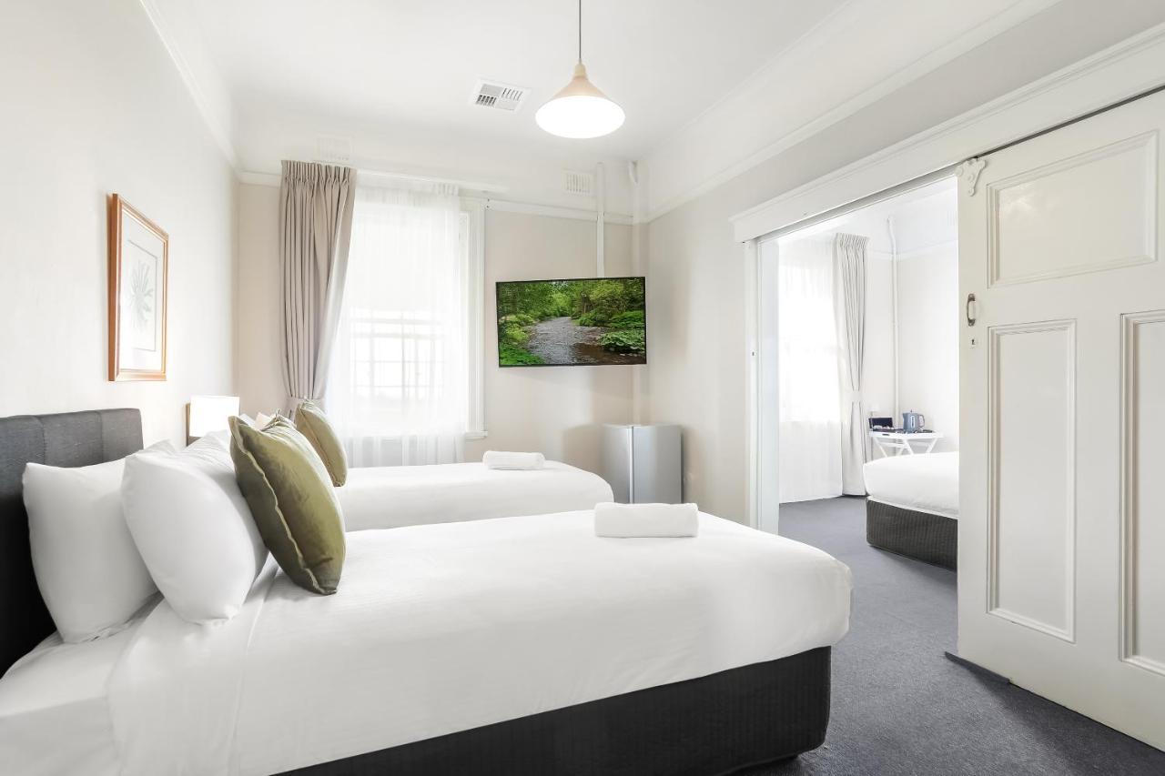 Family Room with Shared Bathroom (2 Adults + 2 Children)