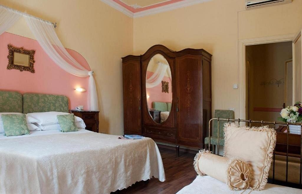 Dreibettzimmer mit Meerblick