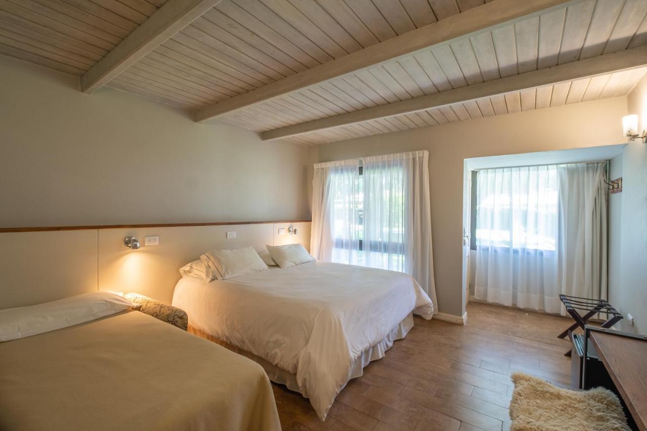 Habitación Triple con vistas al jardín