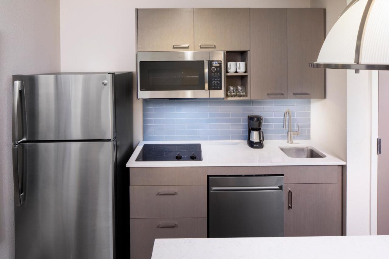 One-Bedroom Specialty Suite Two Queen Beds Kitchen Sofa Bed
