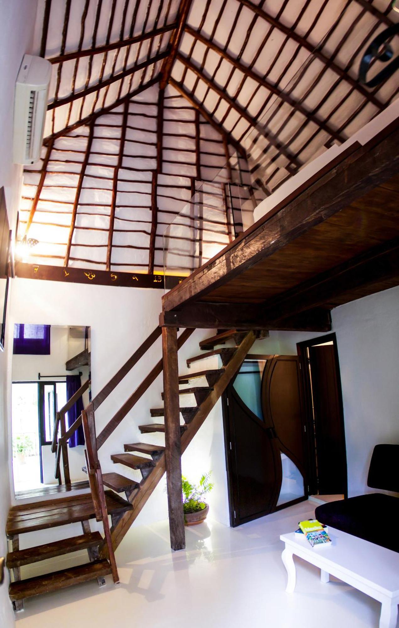 loft with king size bed and sofa bed