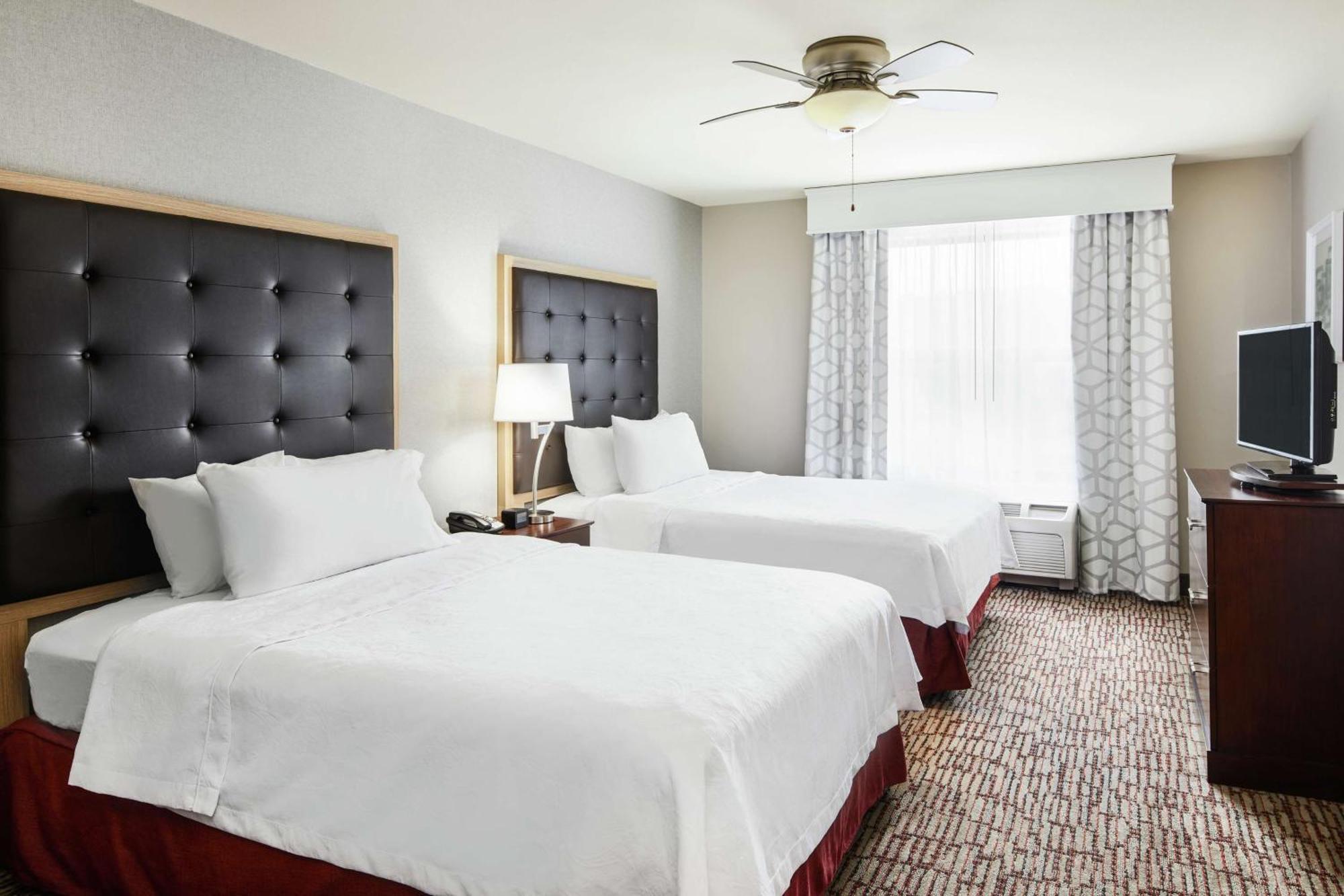 Two Bedroom Suite with One King and Two Queen Beds - Non-Smoking