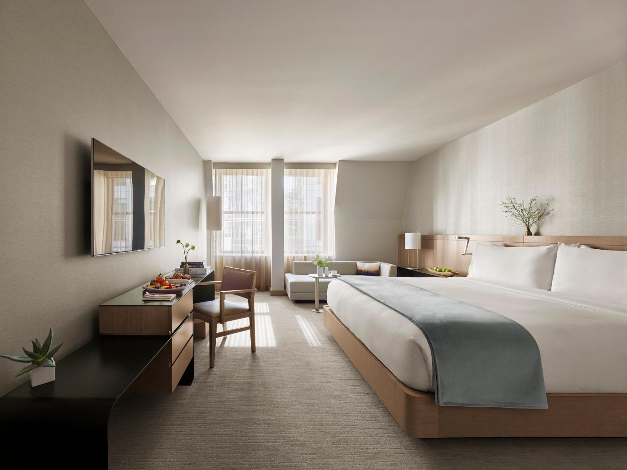 Quarto premier com 1 cama king-size e vista da cidade