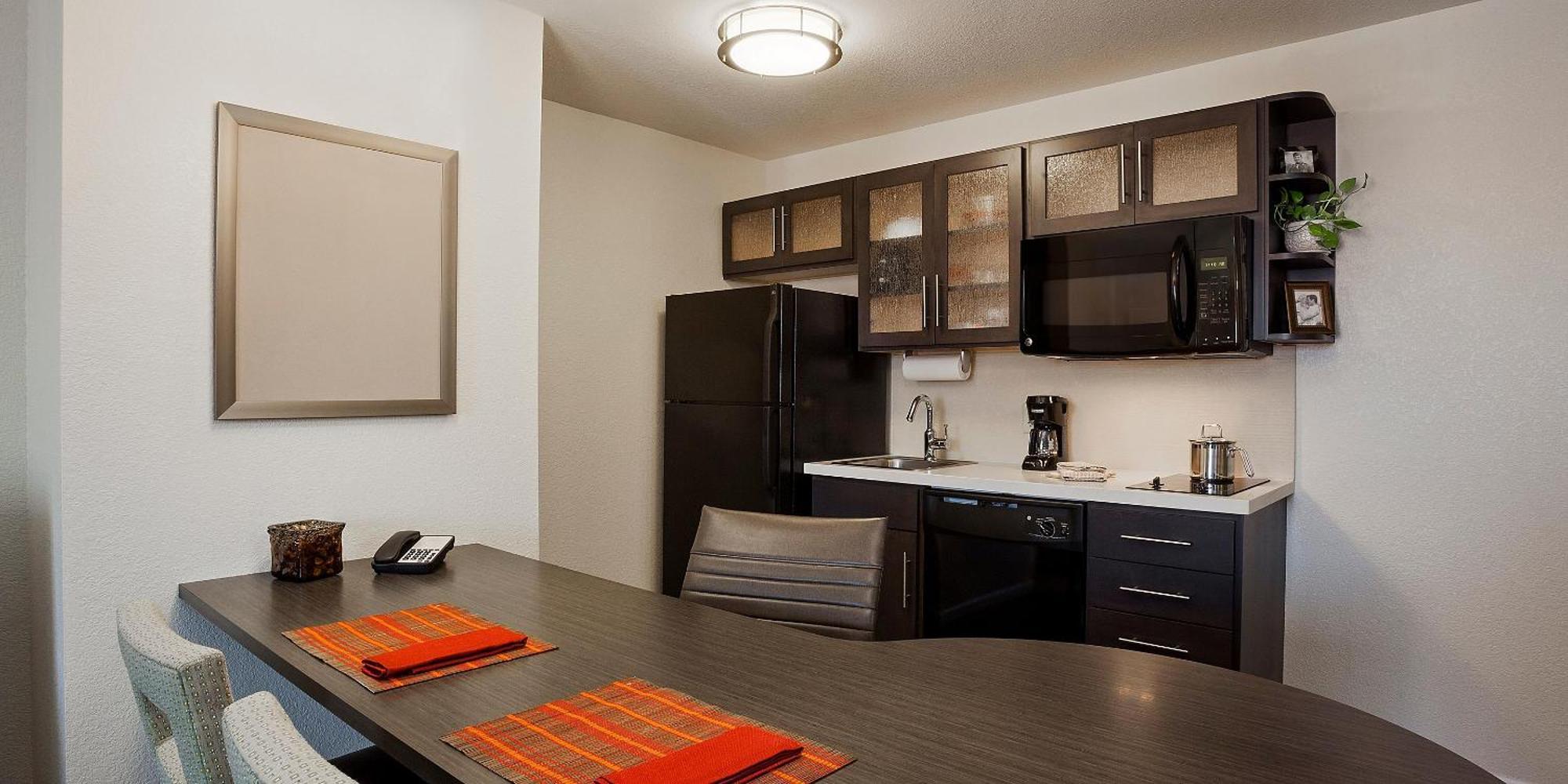 Queen Studio Suite with Roll In Shower - Mobility Accessible
