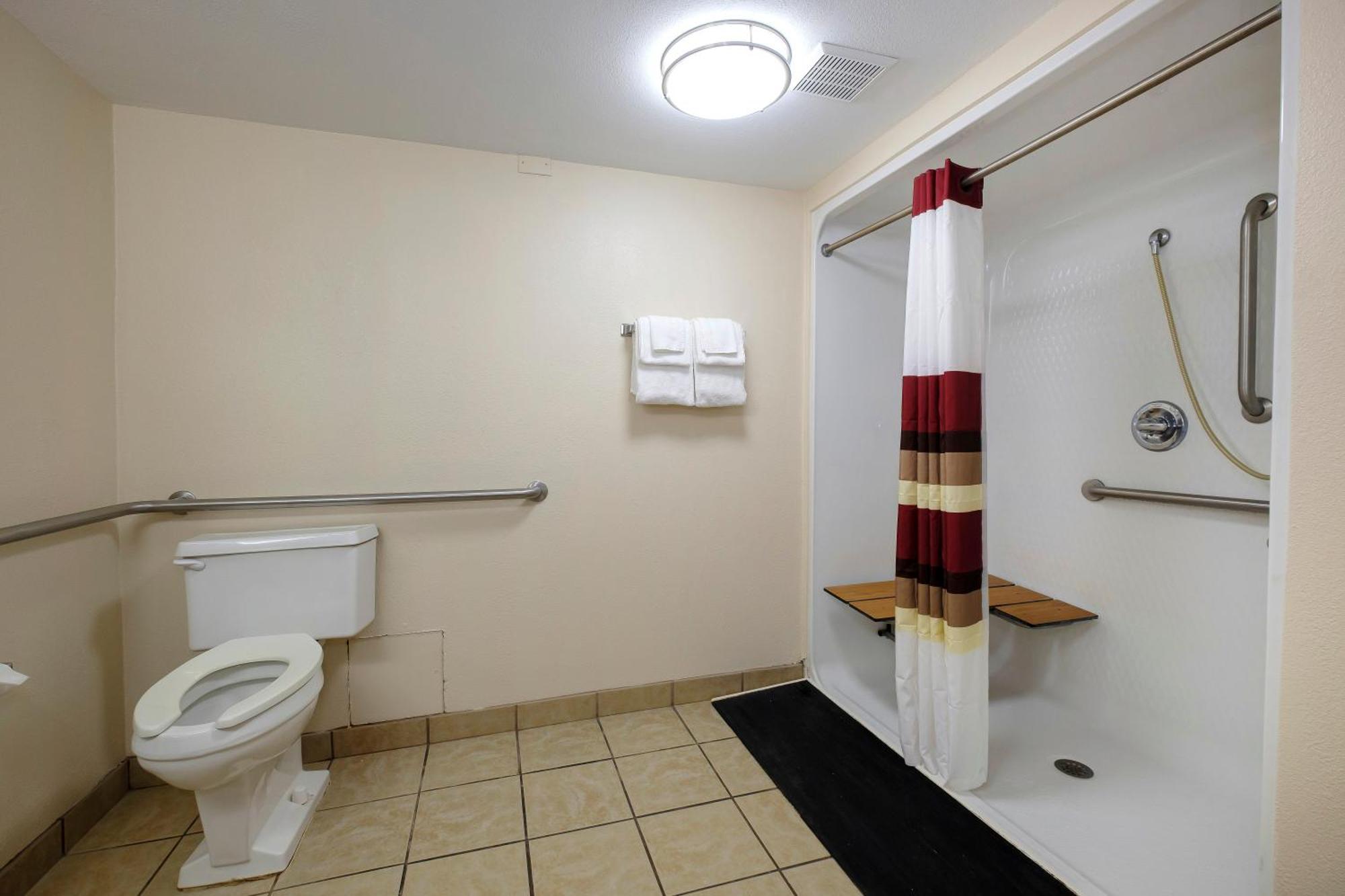 Deluxe King Room Disability Accessible with Roll-In Shower - Non-Smoking