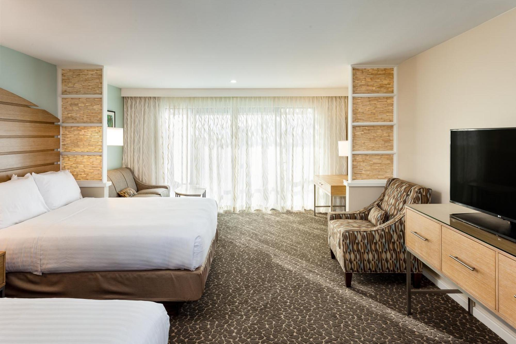 Suite Doble con 2 camas grandes y 1 sofá cama
