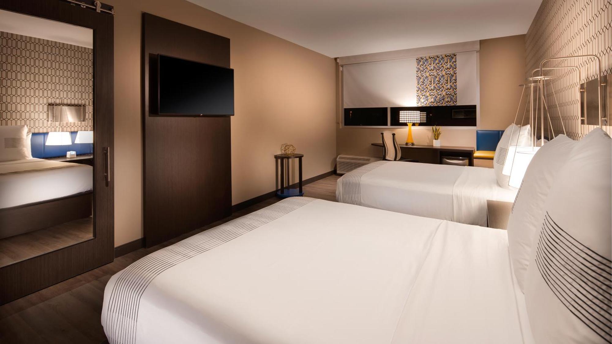 Kamer met 2 Queensize Bedden