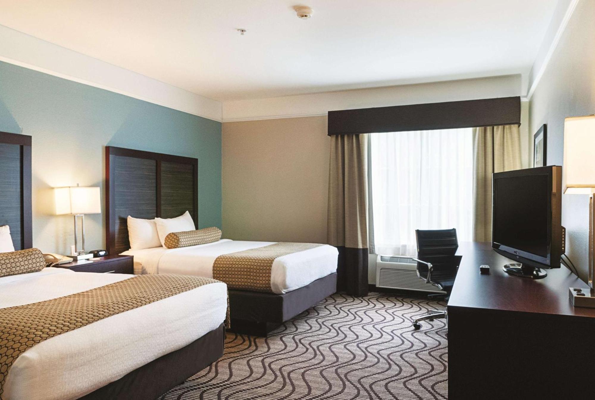 Queen Room Two Queen Beds Roll Shower Mobility Accessible or Non-Smoking