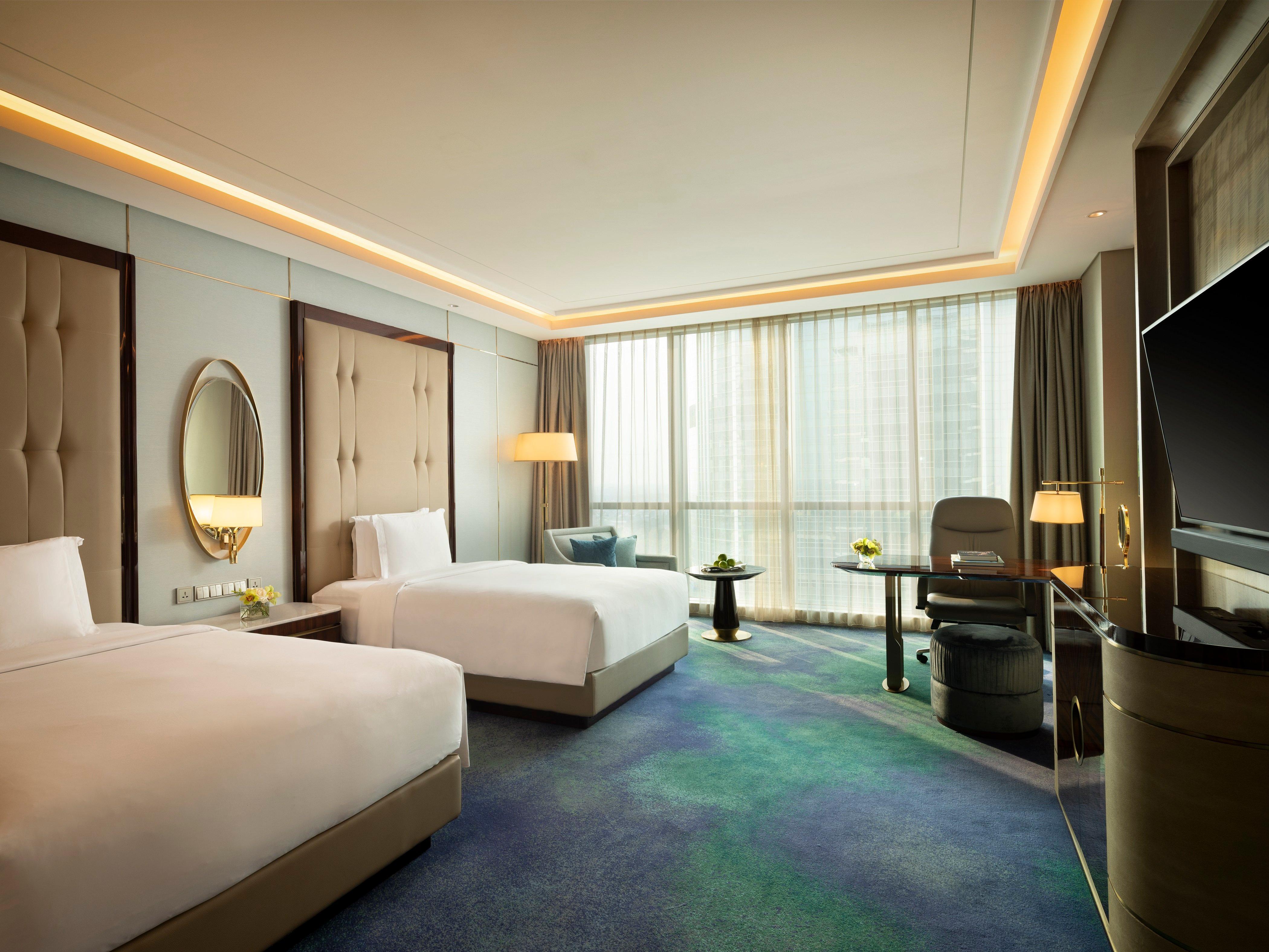 Habitación Premium con 2 camas individuales y acceso al salón Club