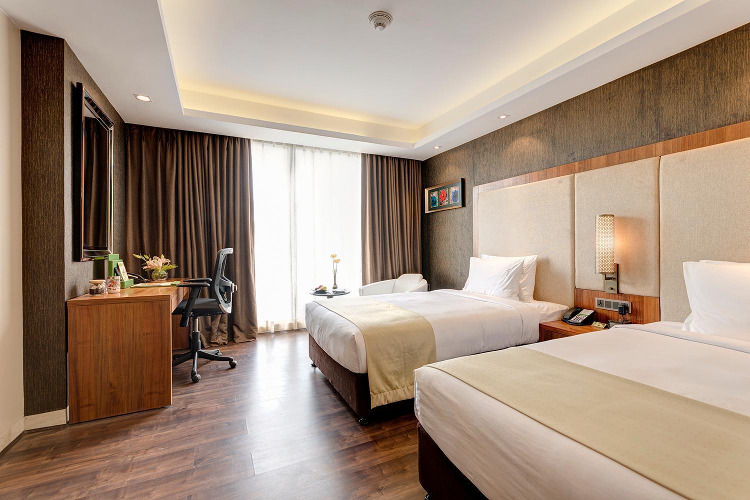 Standard Twin Room Walk Shower Enjoy savings on Food & Beverages soft Happy Hours Buy 1 1 on IMFL 4PM – 8 Complimentary snacks select liquor packages Beer buckets starting from just ₹599 pricing on liquor bottl,1283500648:JPEG