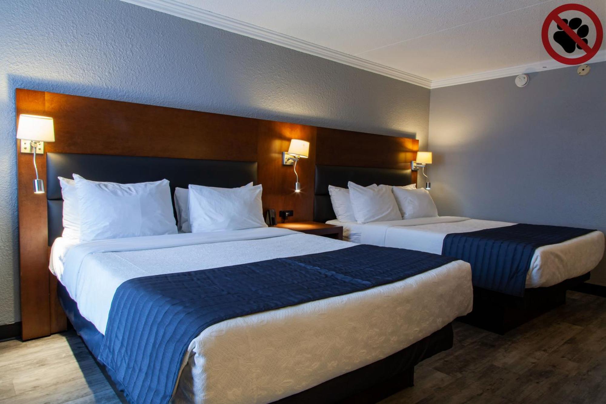 Queen Room with Two Queen Beds and Pool Access - Non-Smoking