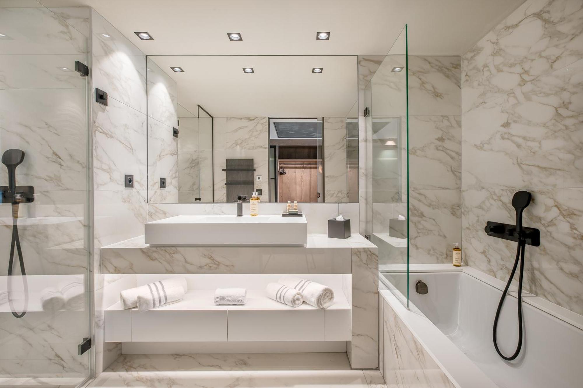 Deluxe Suite with Balcony complimentary spa access